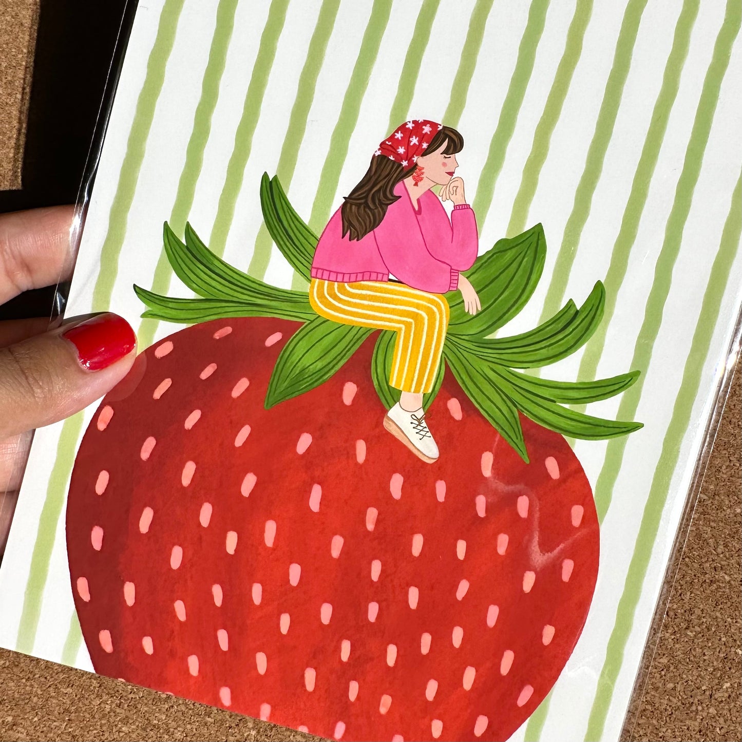 Illustration of a person sitting on a strawberry with a striped background