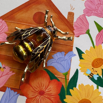 Enamel Gold Bee Brooch / Pin on a wild flower Bee hive Illustration backing card