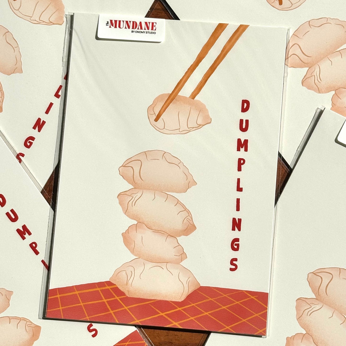 Packaging for dumplings with chopsticks and text on a patterned background