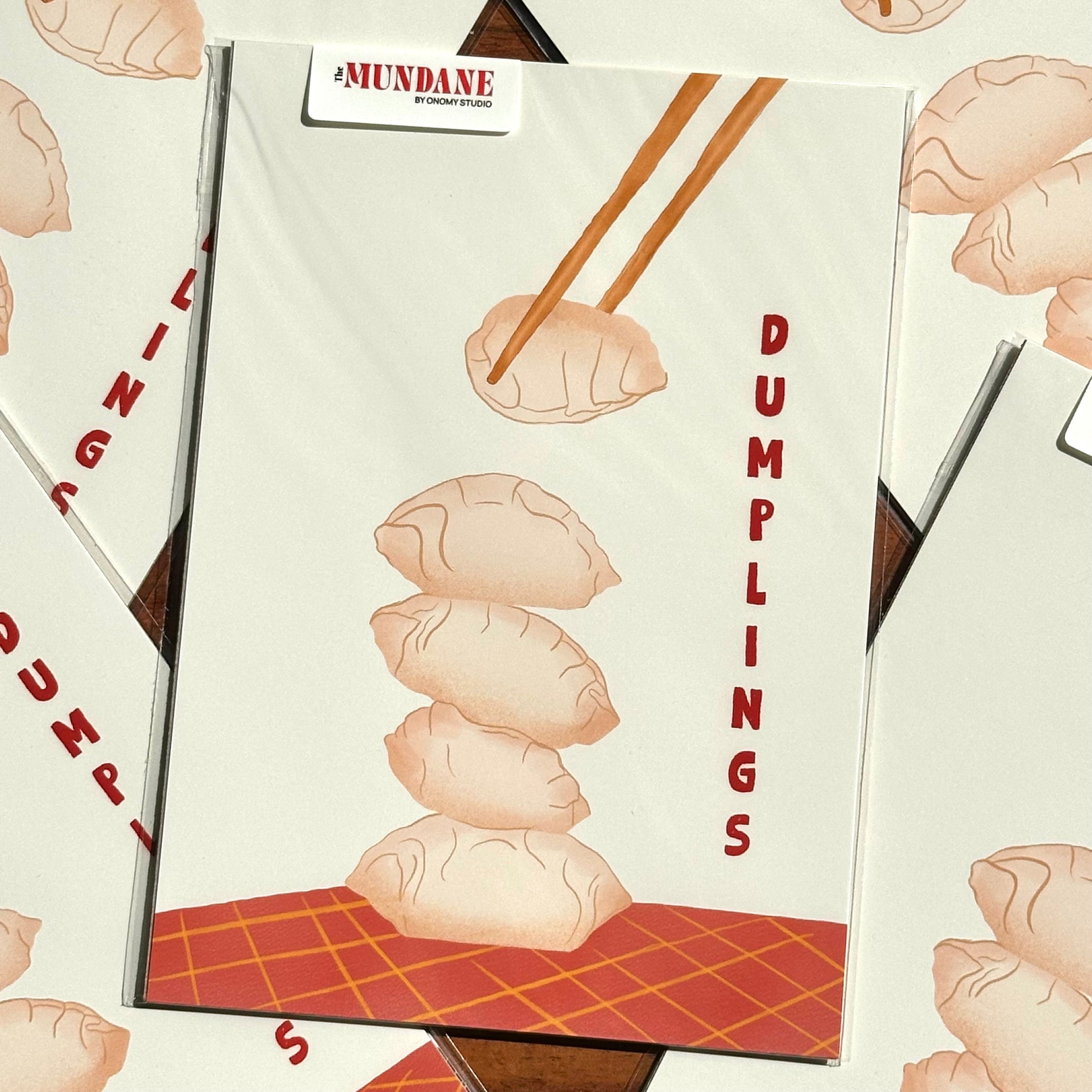 Packaging for dumplings with chopsticks and text on a patterned background