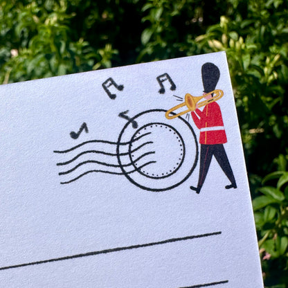 Designed by onomy Studio Close up detail of Tower Bridge illustration postcard, London souvenir with hand drawn Thames Beefeaters
