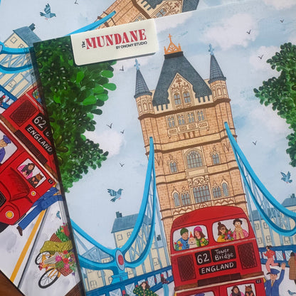 Illustrated book cover with Tower Bridge and a red bus, featuring the brand 'The Mundane'.
