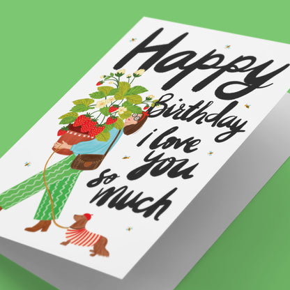 Girl Holding Strawberry Plant with Sausage Dog Greeting Card