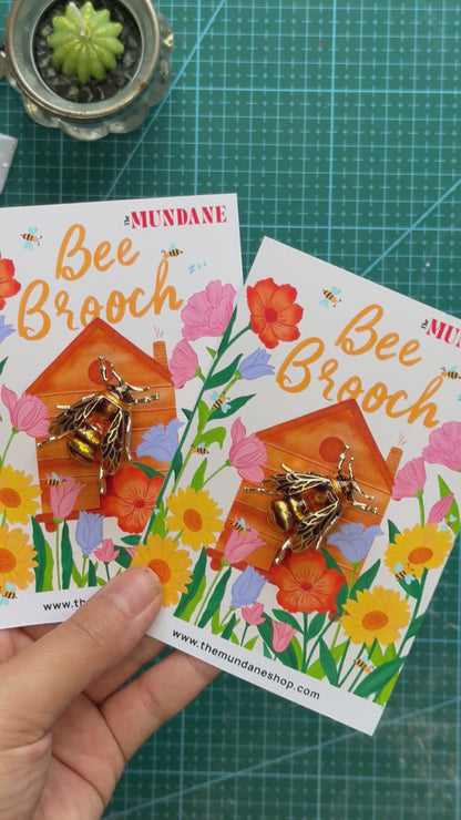 Enamel Gold Bee Brooch / Pin on a wild flower Bee hive Illustration backing card